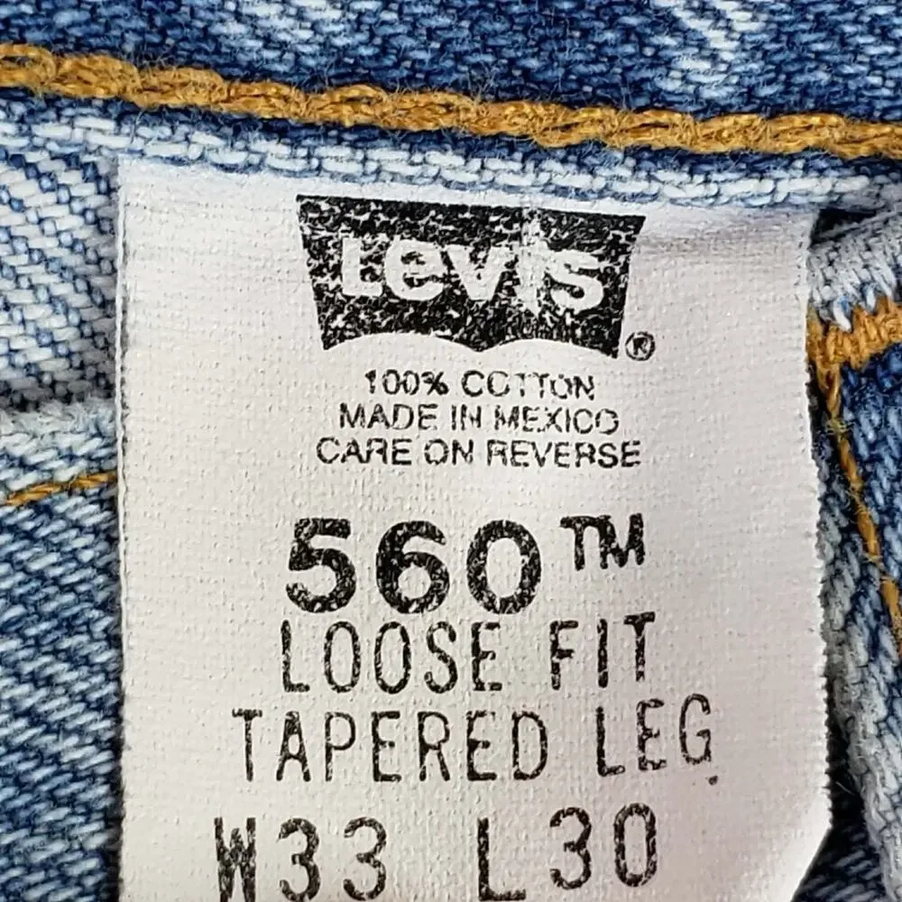 VTG Levis 560 Jeans Mens 33x30 Light Wash Blue Loose Fit Tapered Leg Faded 90s